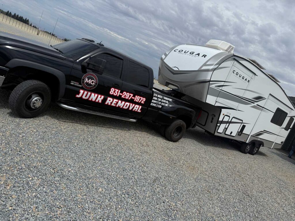 What Speeds Up a Same-Day Haul (and What Slows It Down) 28 Black truck parked next to trailer, representing same-day hauling capabilities in Hollister.